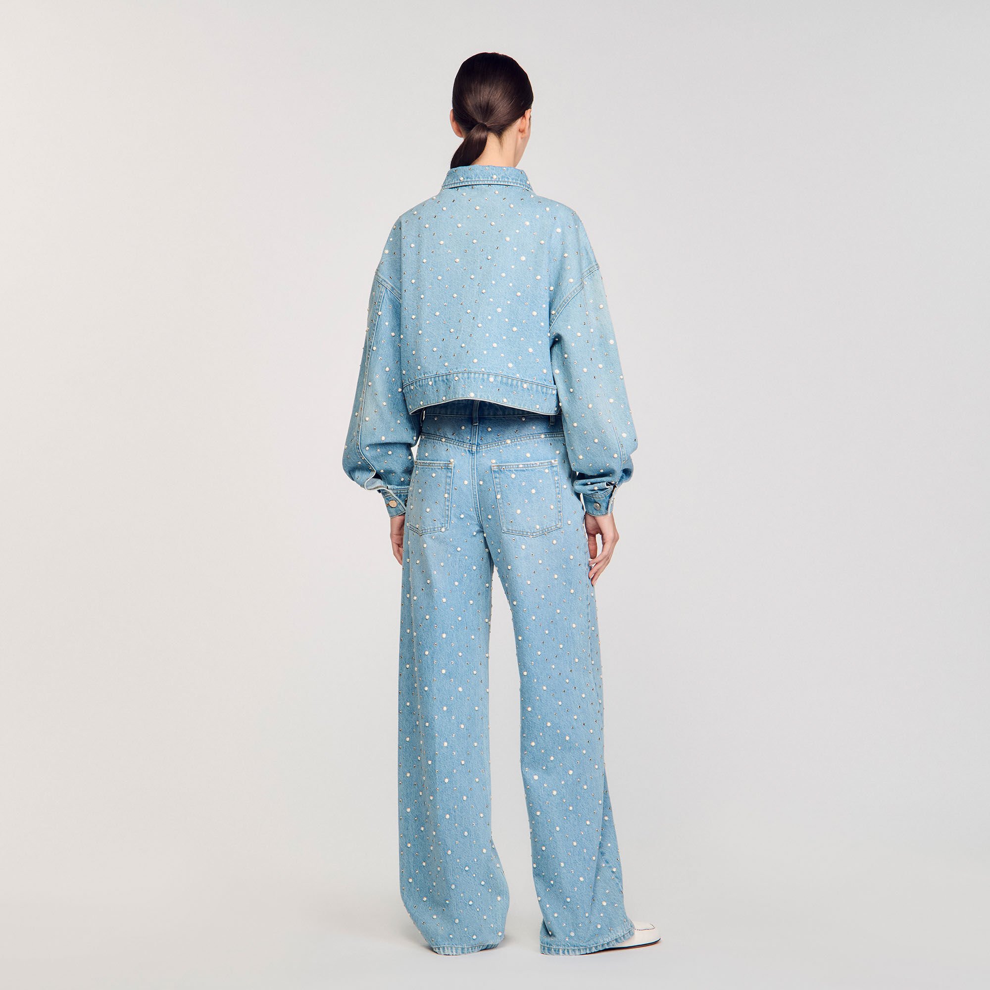 Blouson en jean strassé et perlé