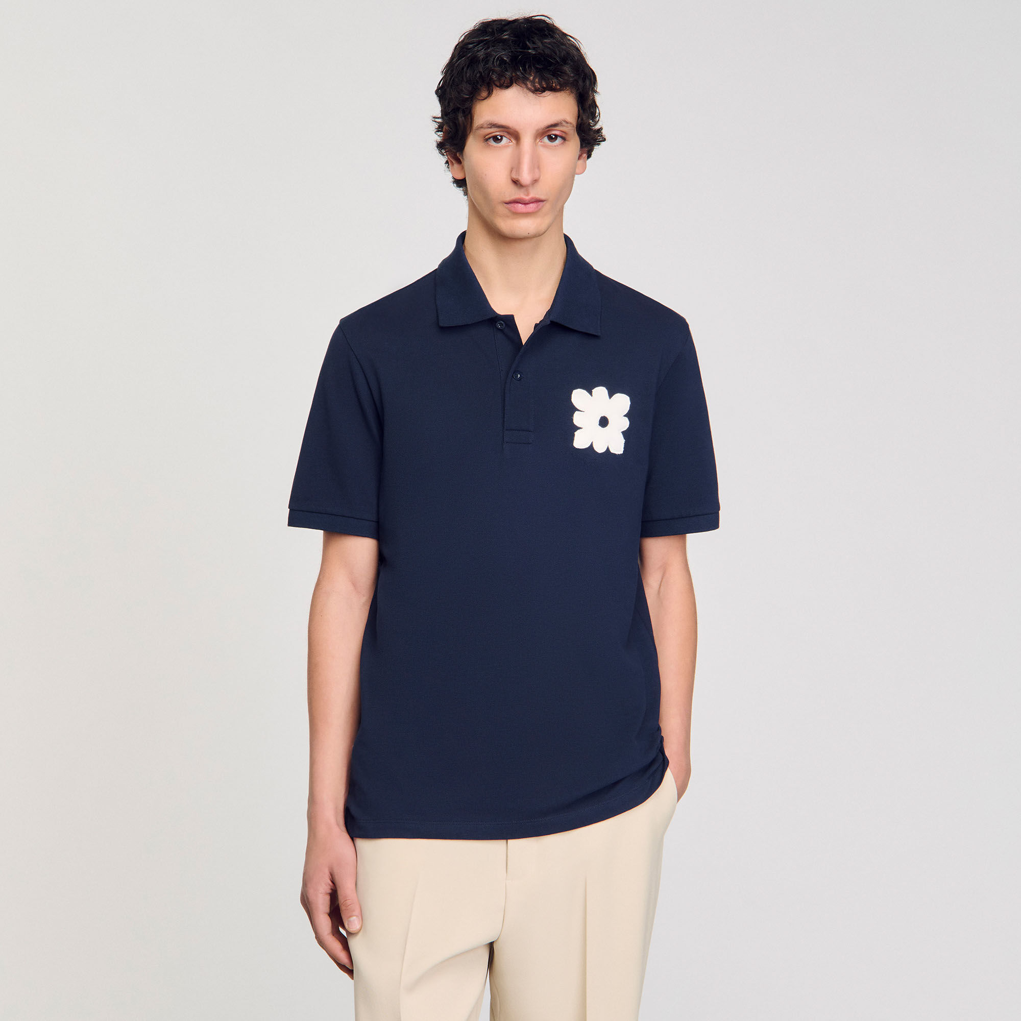 Polo à patch fleur