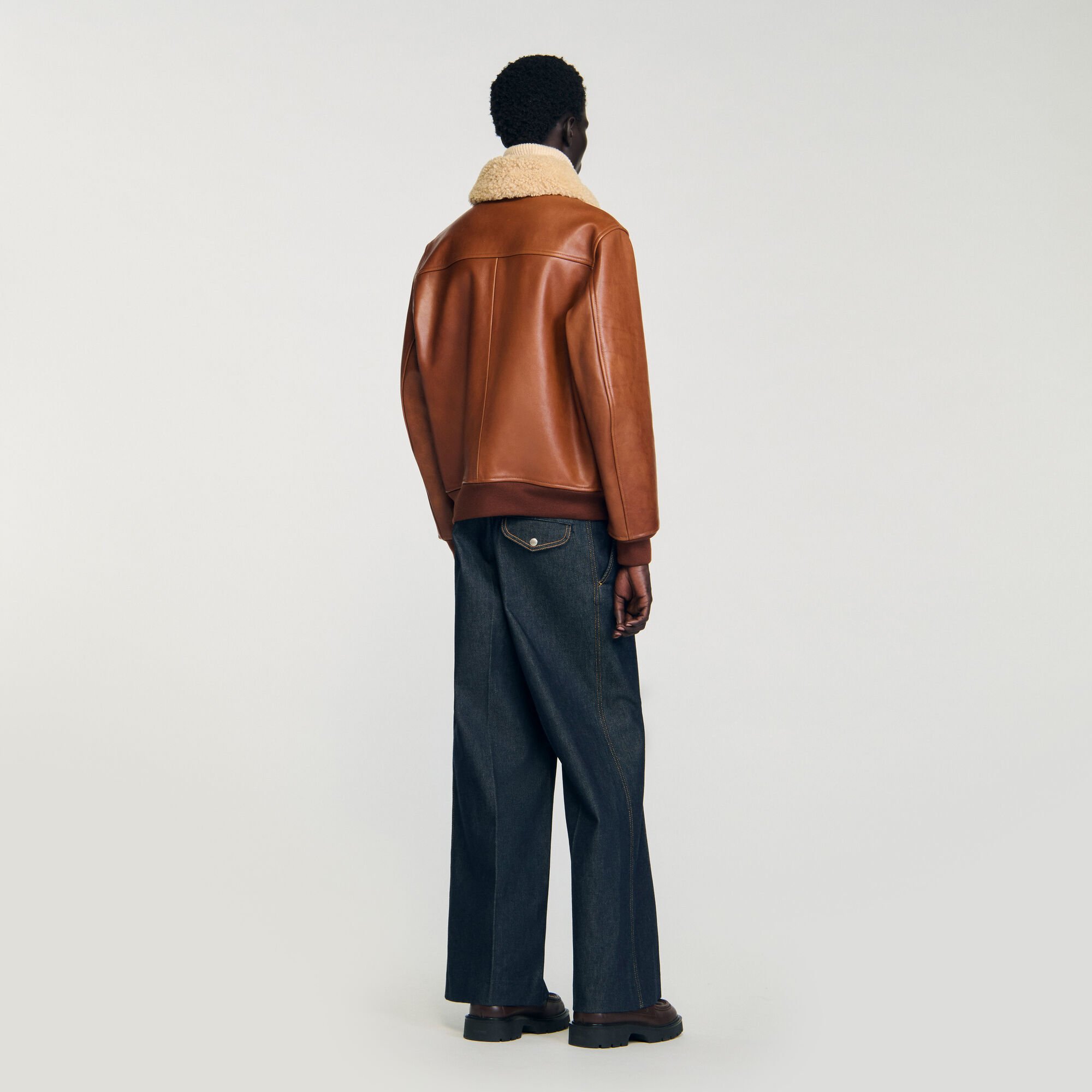 Blouson en cuir à col fourré