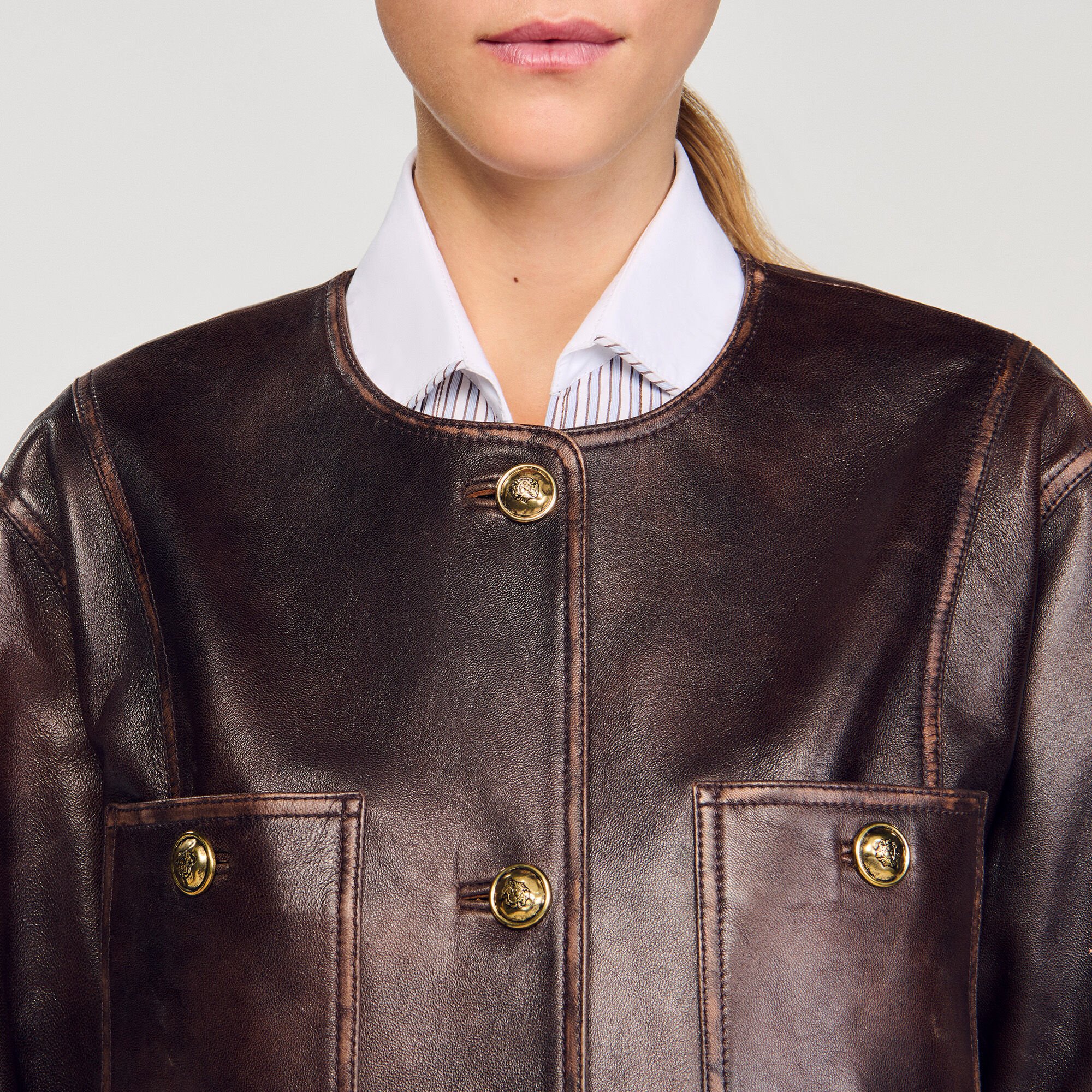 Blouson long en cuir vieilli