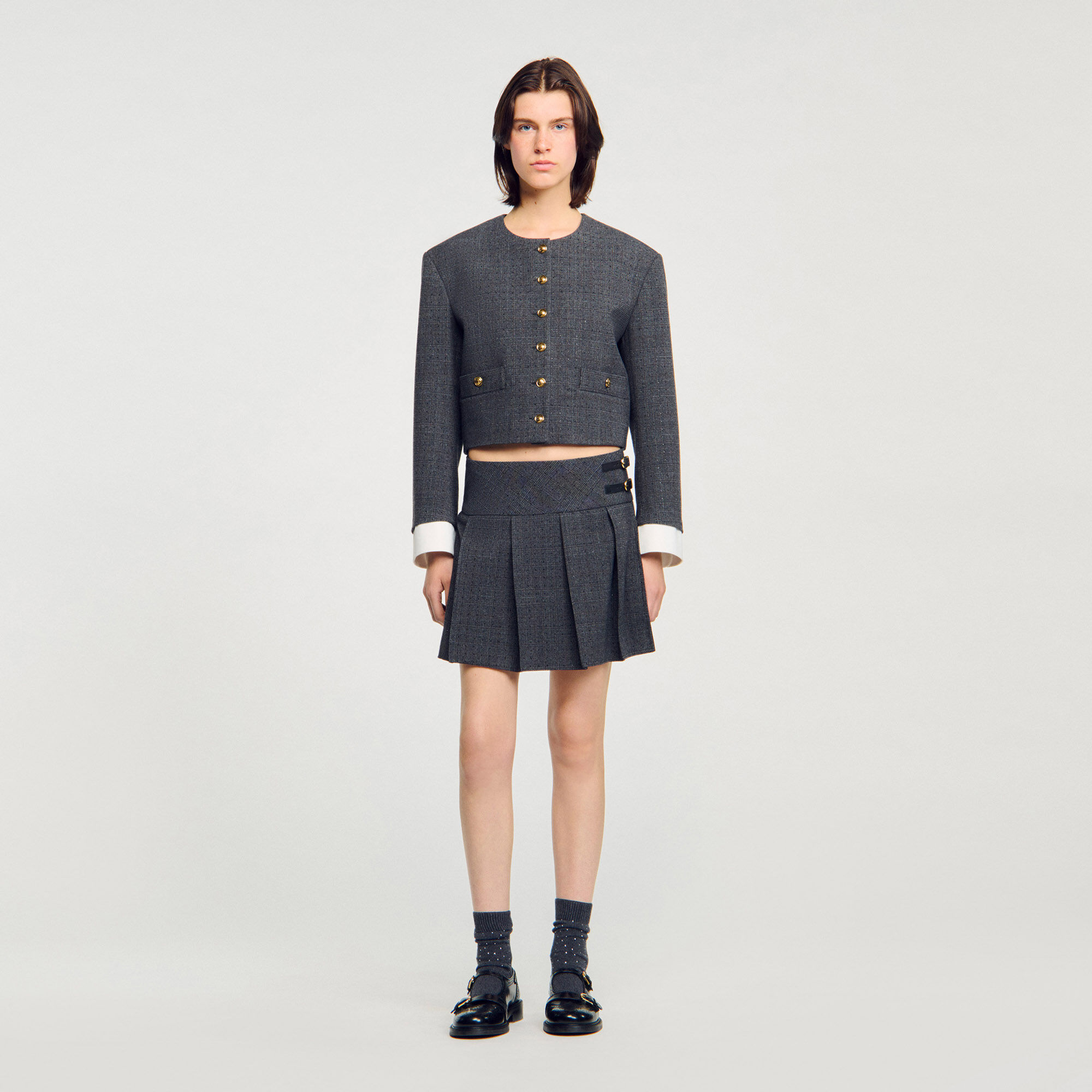 Jupe courte de tailleur strassée