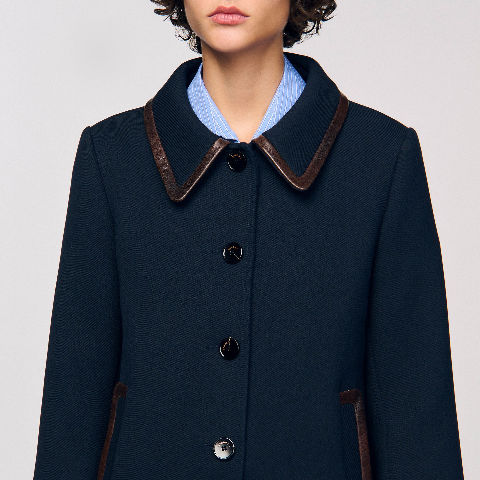 Manteau à bandes en cuir
