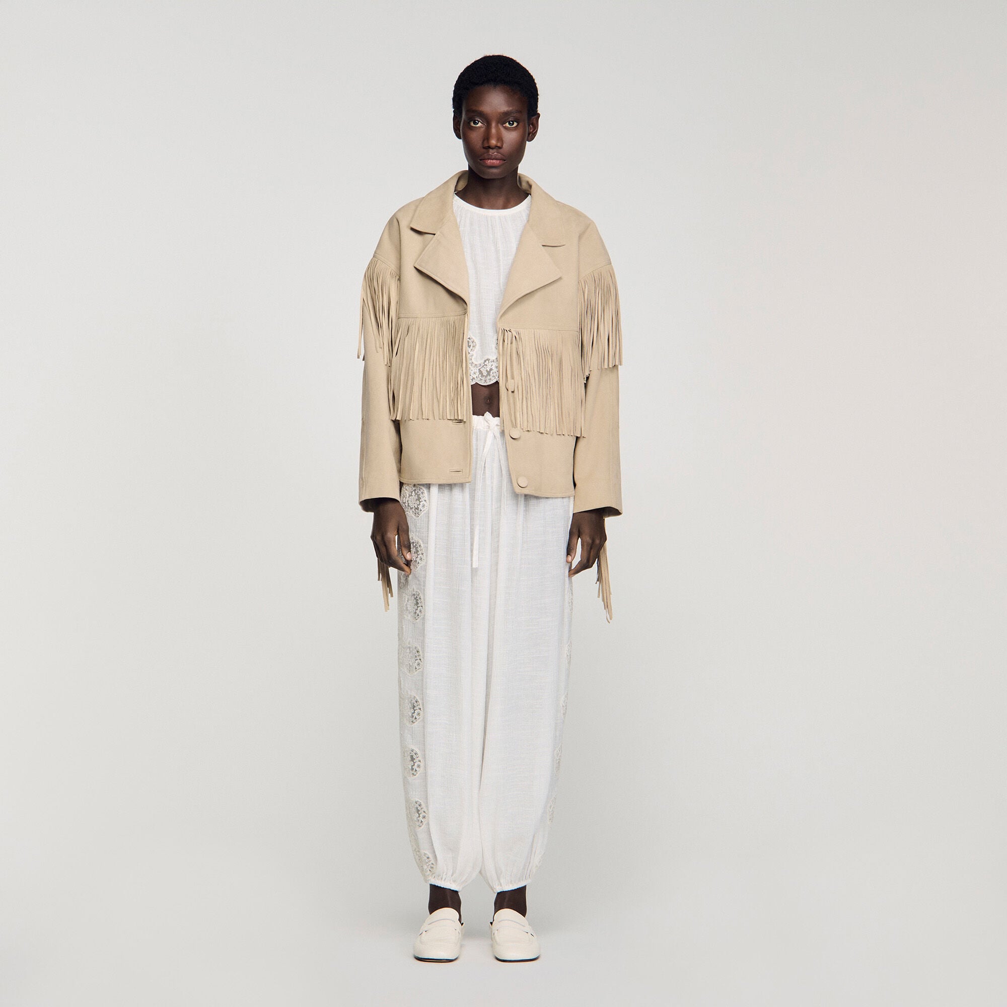 Blouson cuir su&egrave;de &agrave; franges