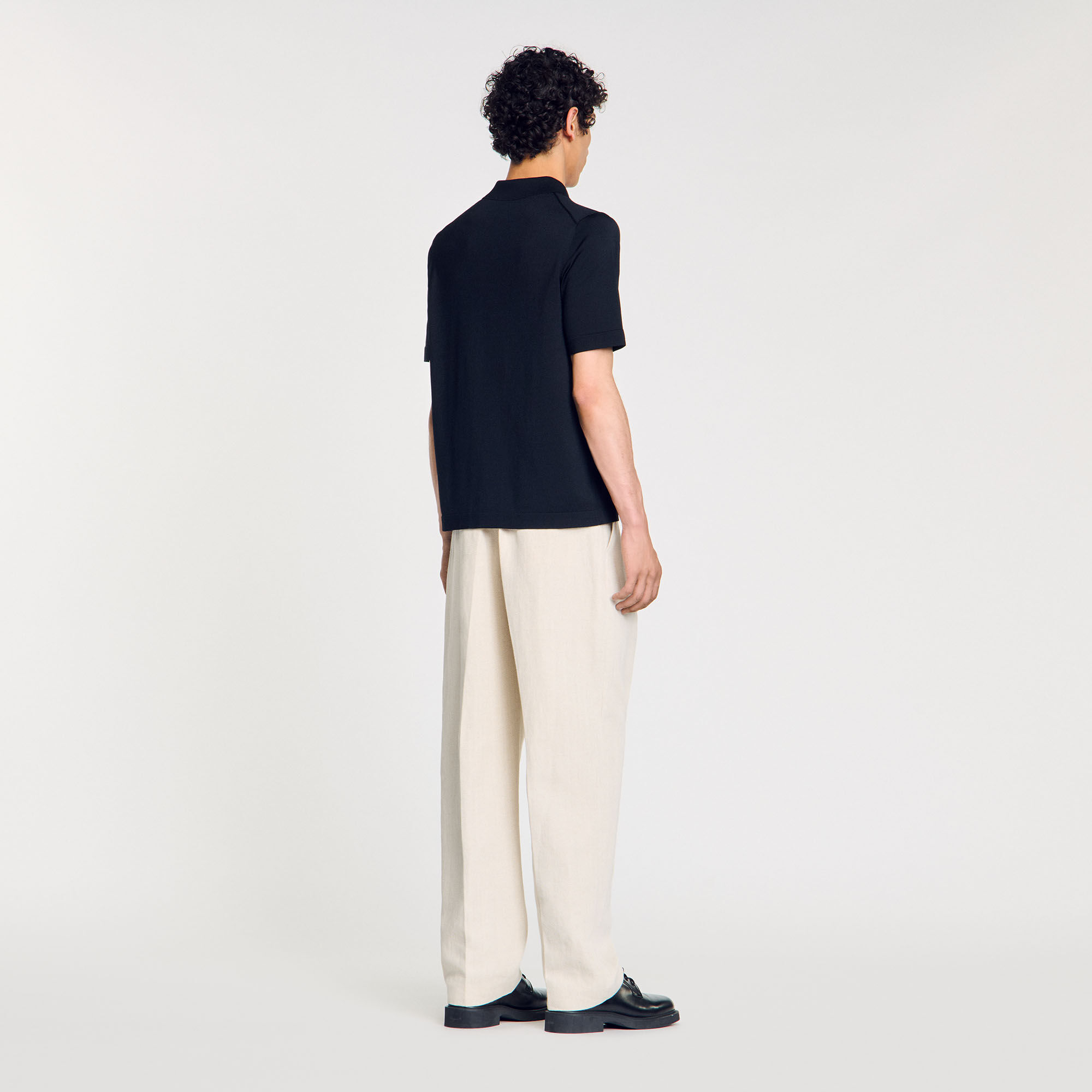 Polo en maille à col zippé