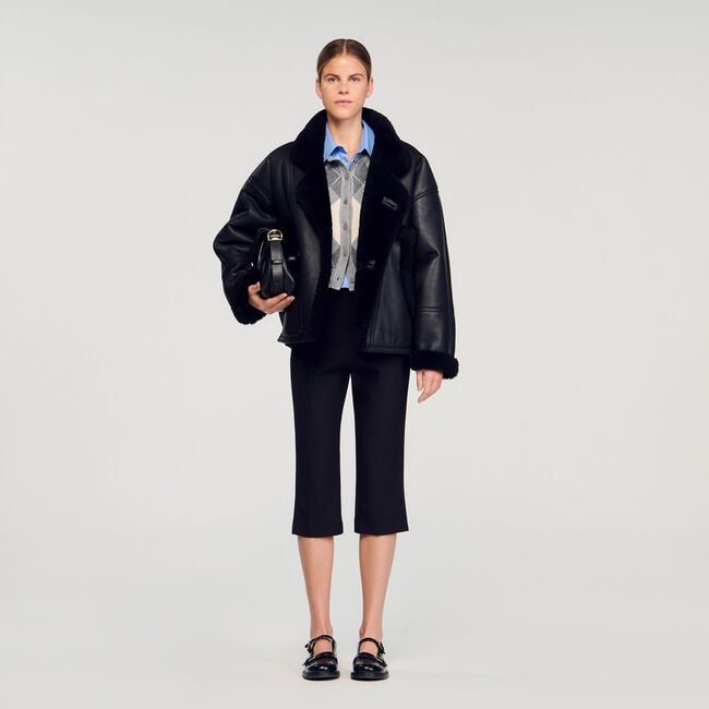 Manteau court en peau lainée