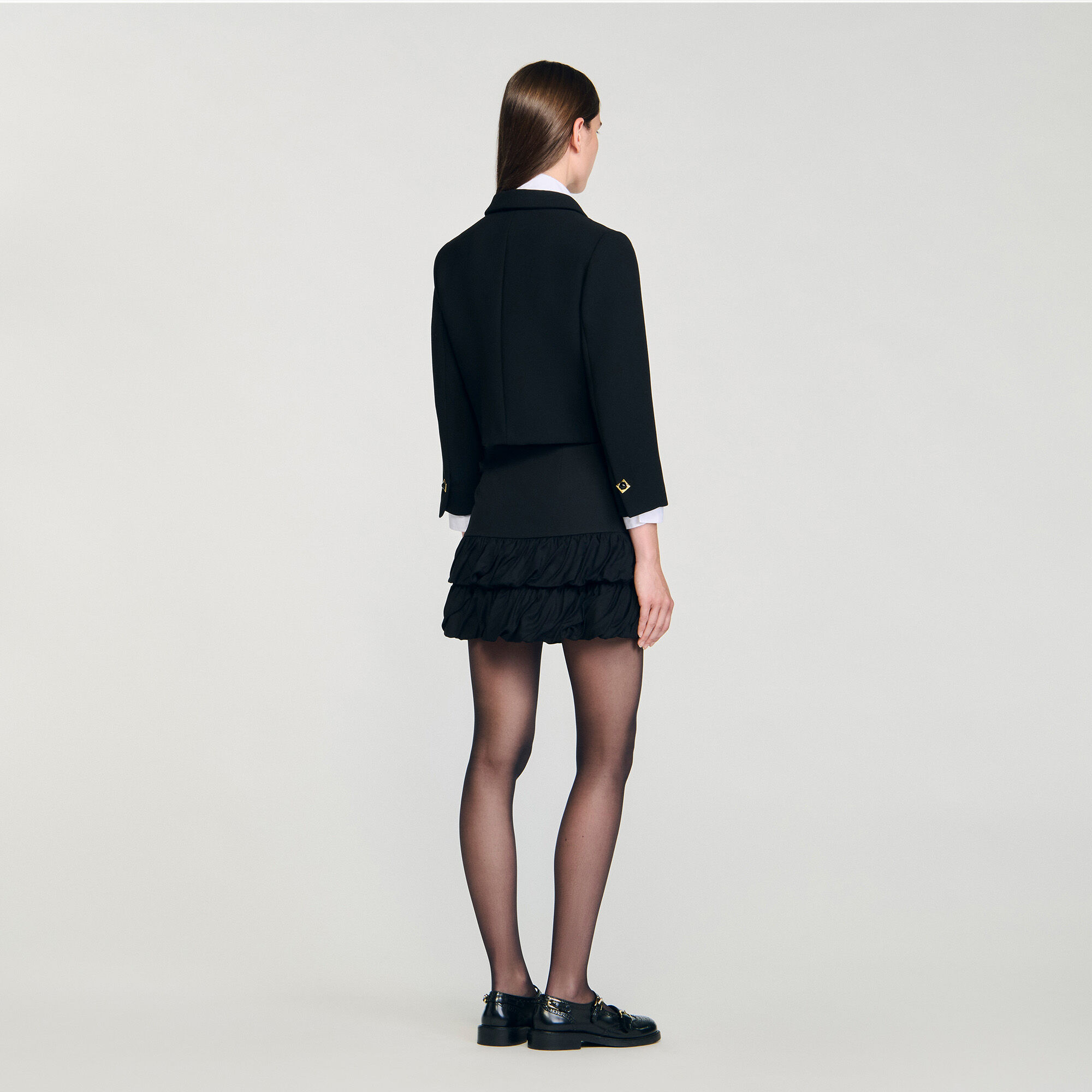 Veste courte à boutons bijou