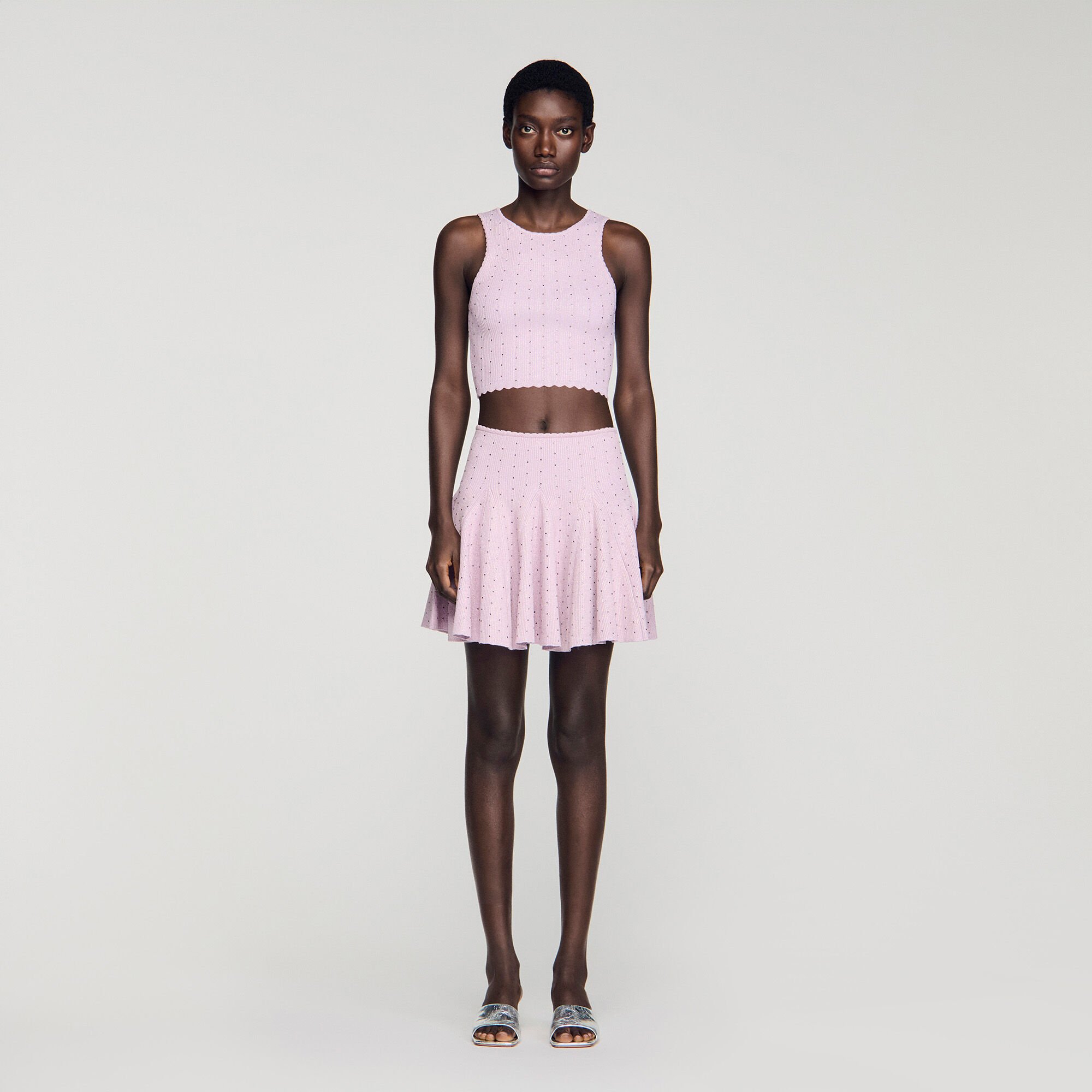 Jupe courte en maille strass&eacute;e