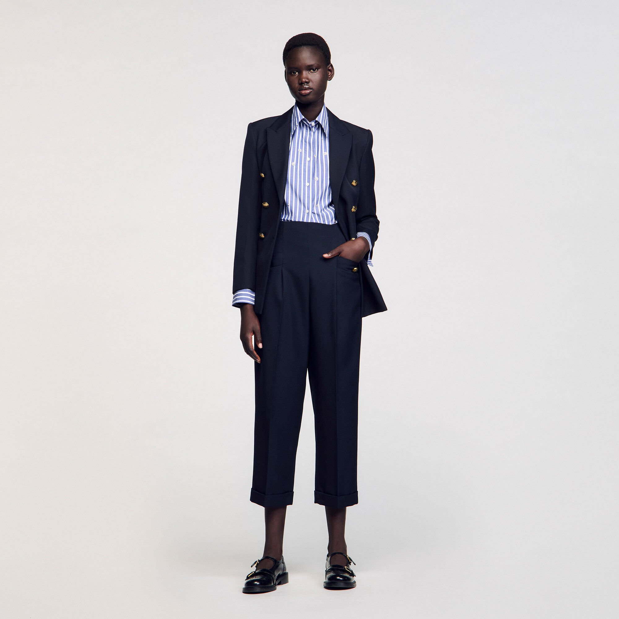 Pantalon de costume à plis