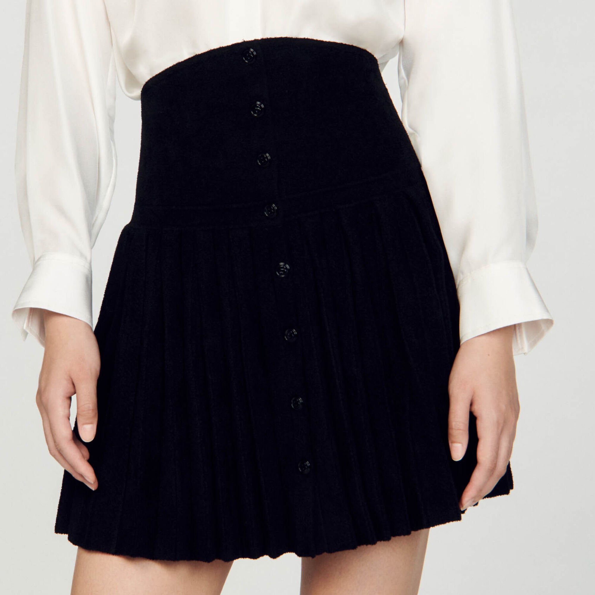 Jupe courte en maille velours
