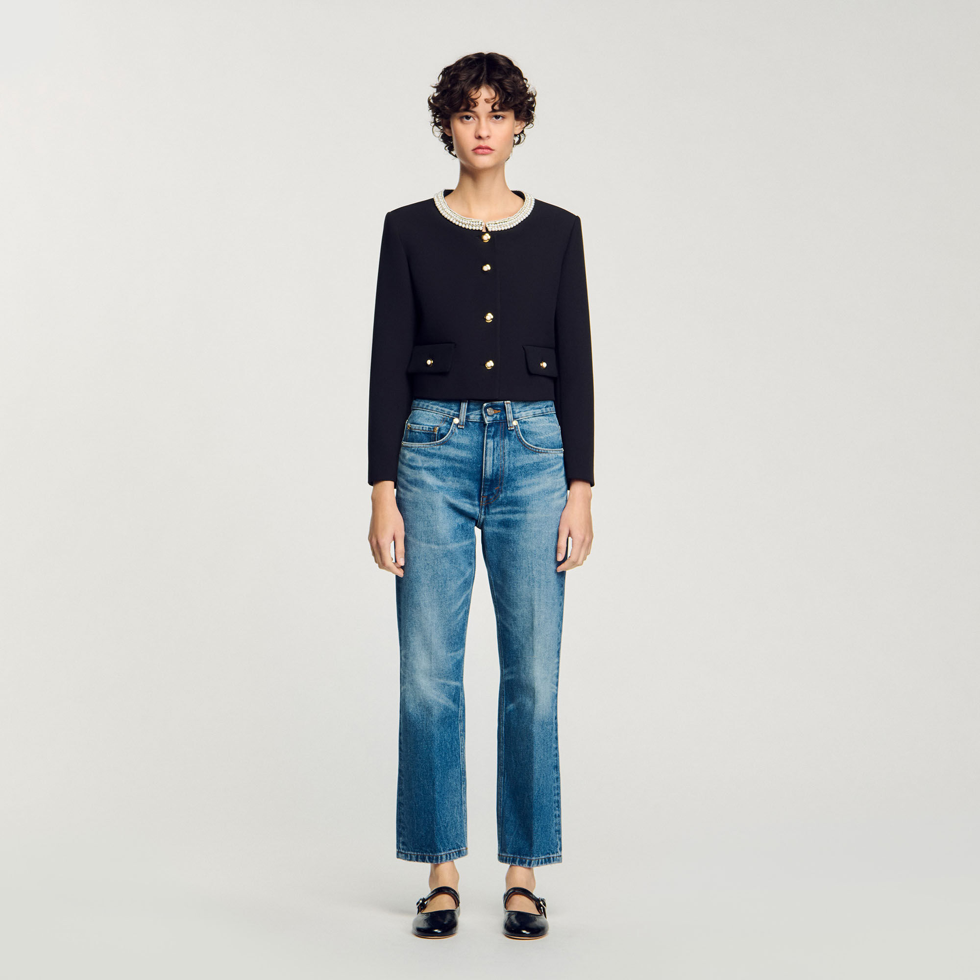 Veste à col perlé