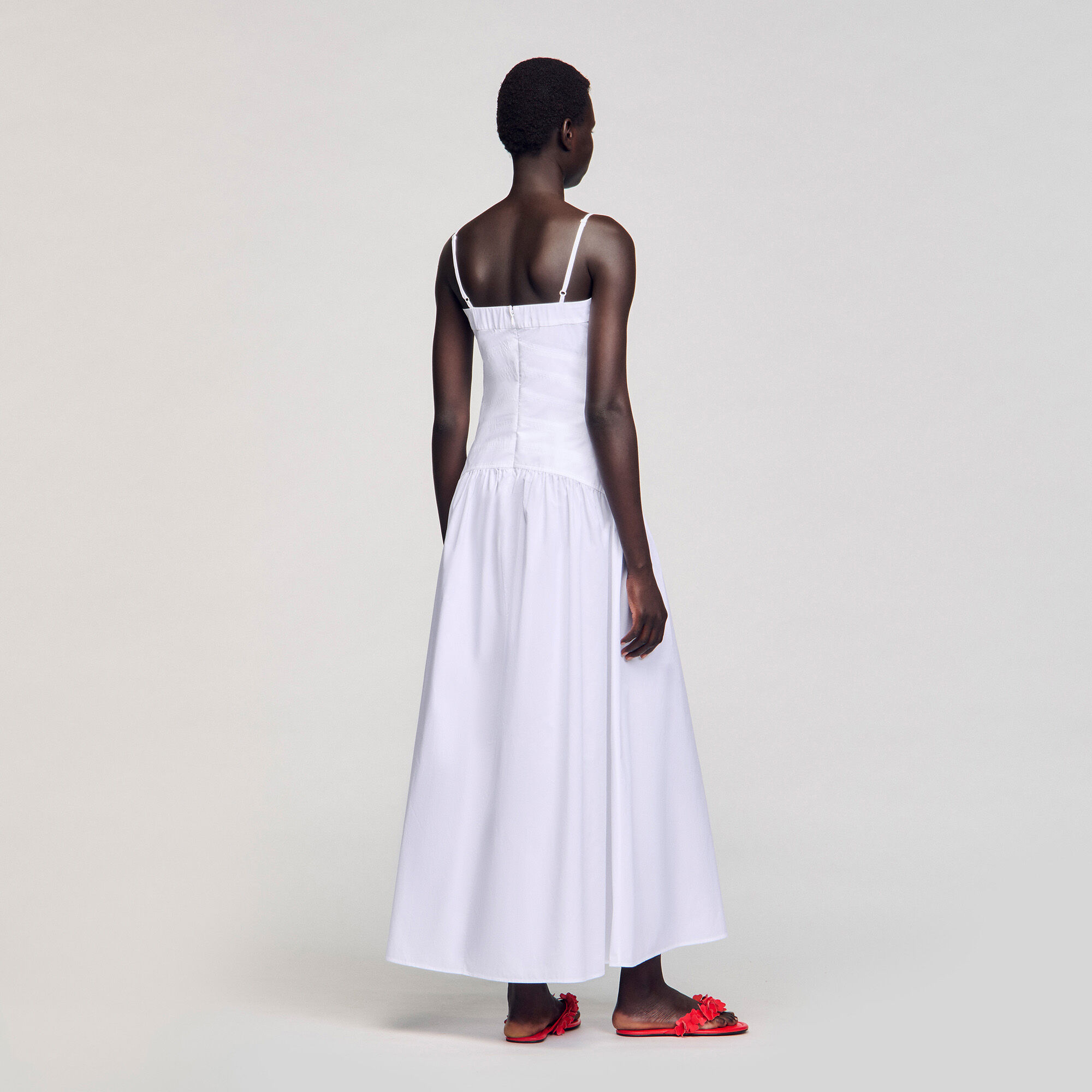 Robe longue à bustier drapé