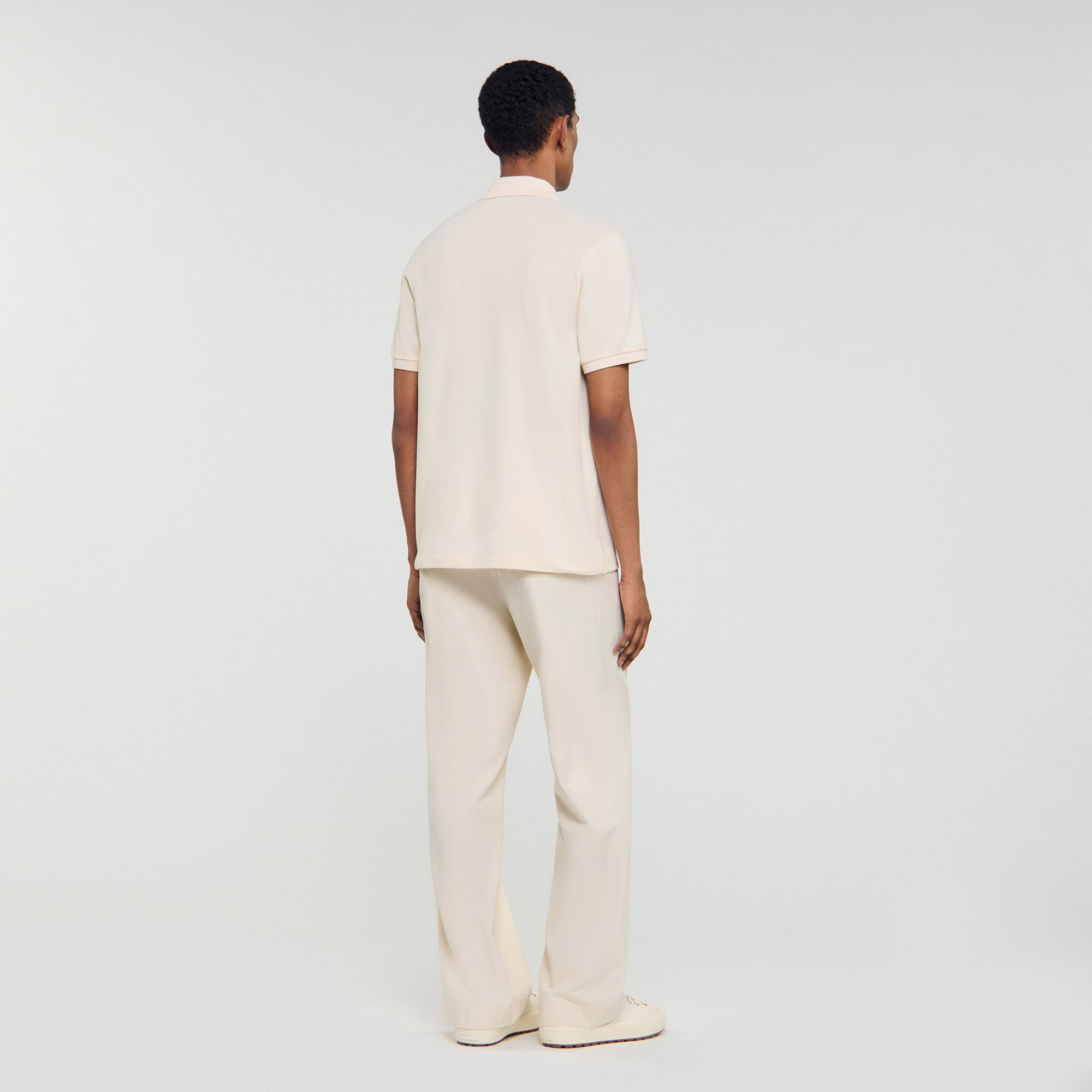Polo à logo cuir