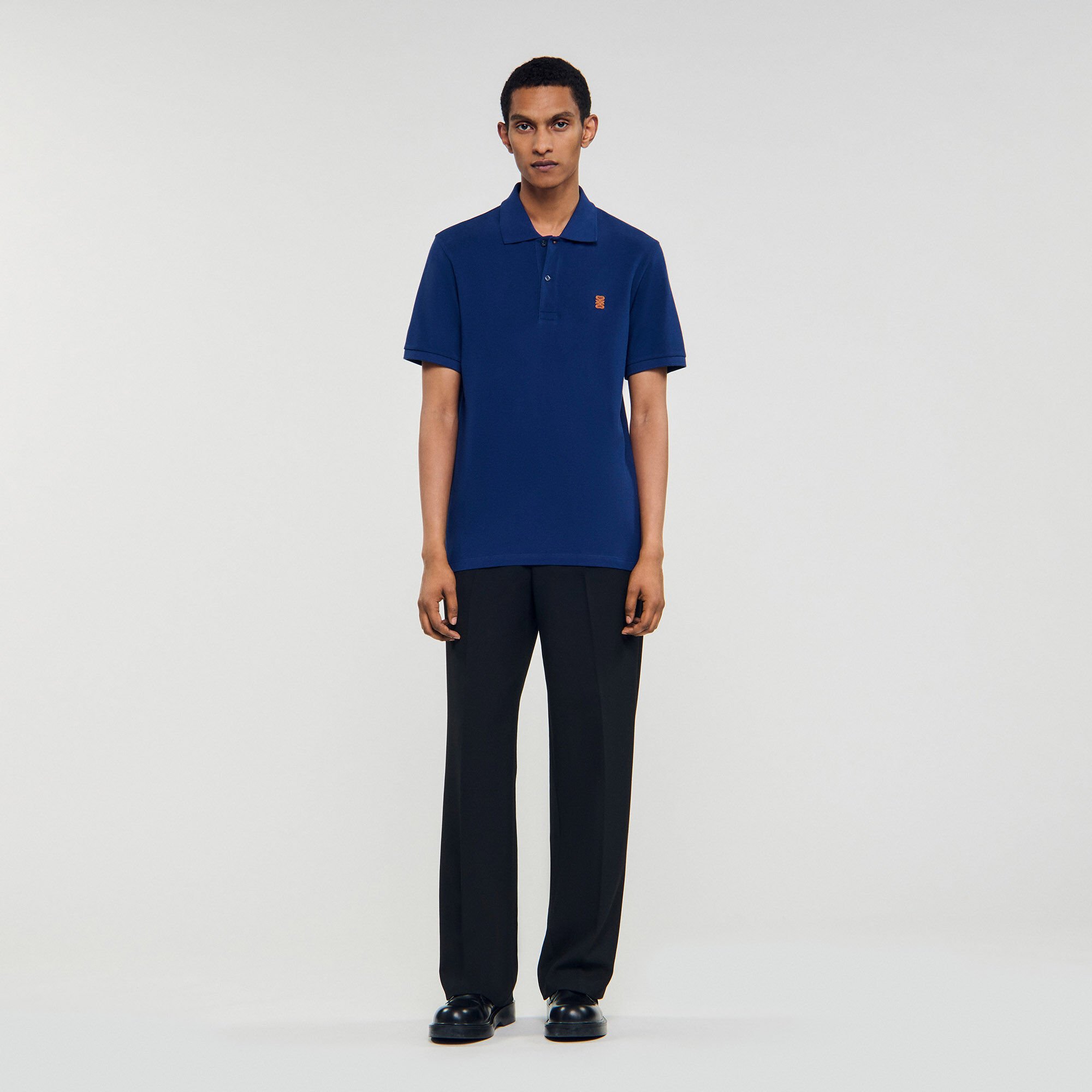 Polo à logo cuir