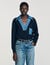 Pull à détails denim