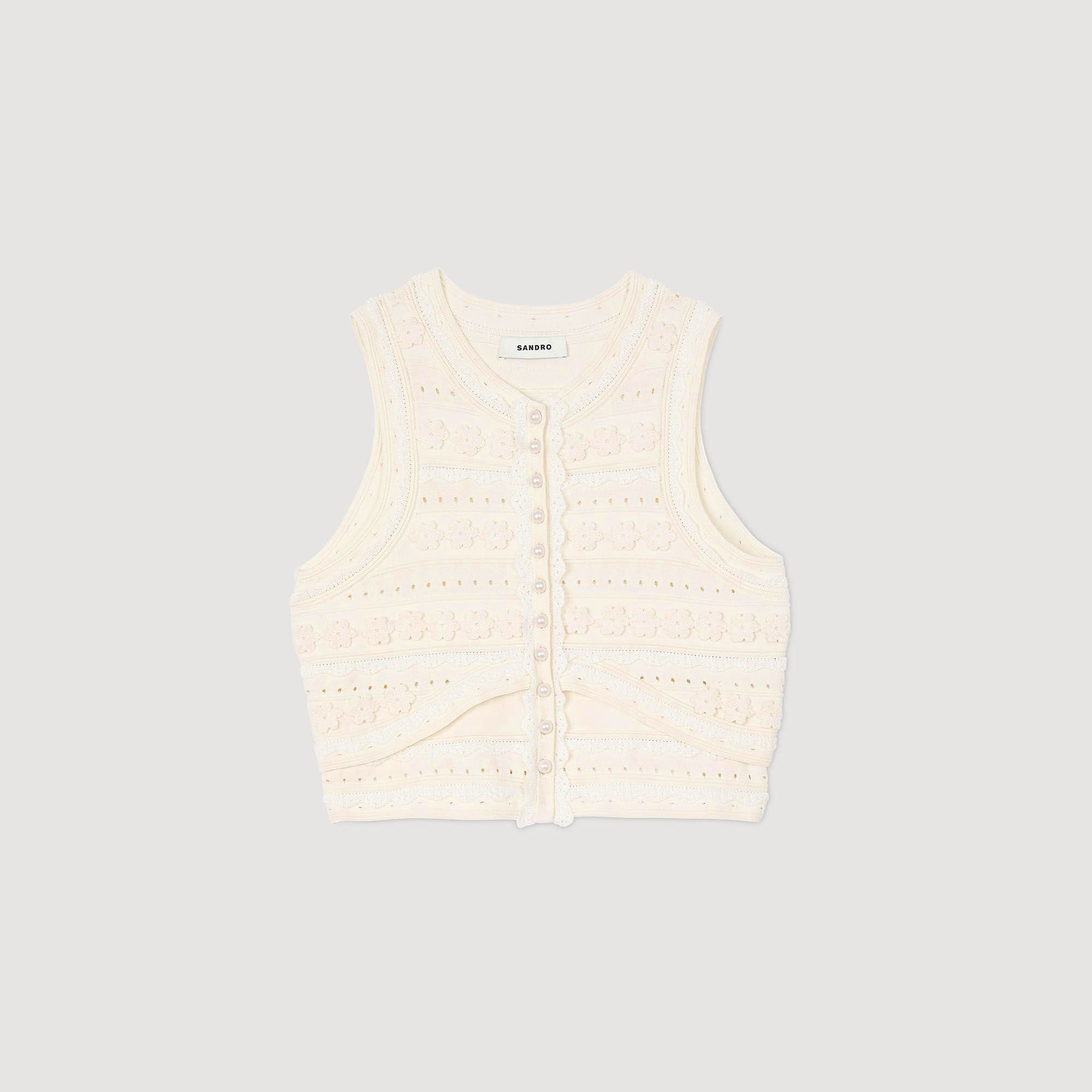 Pull court à détails crochetés
