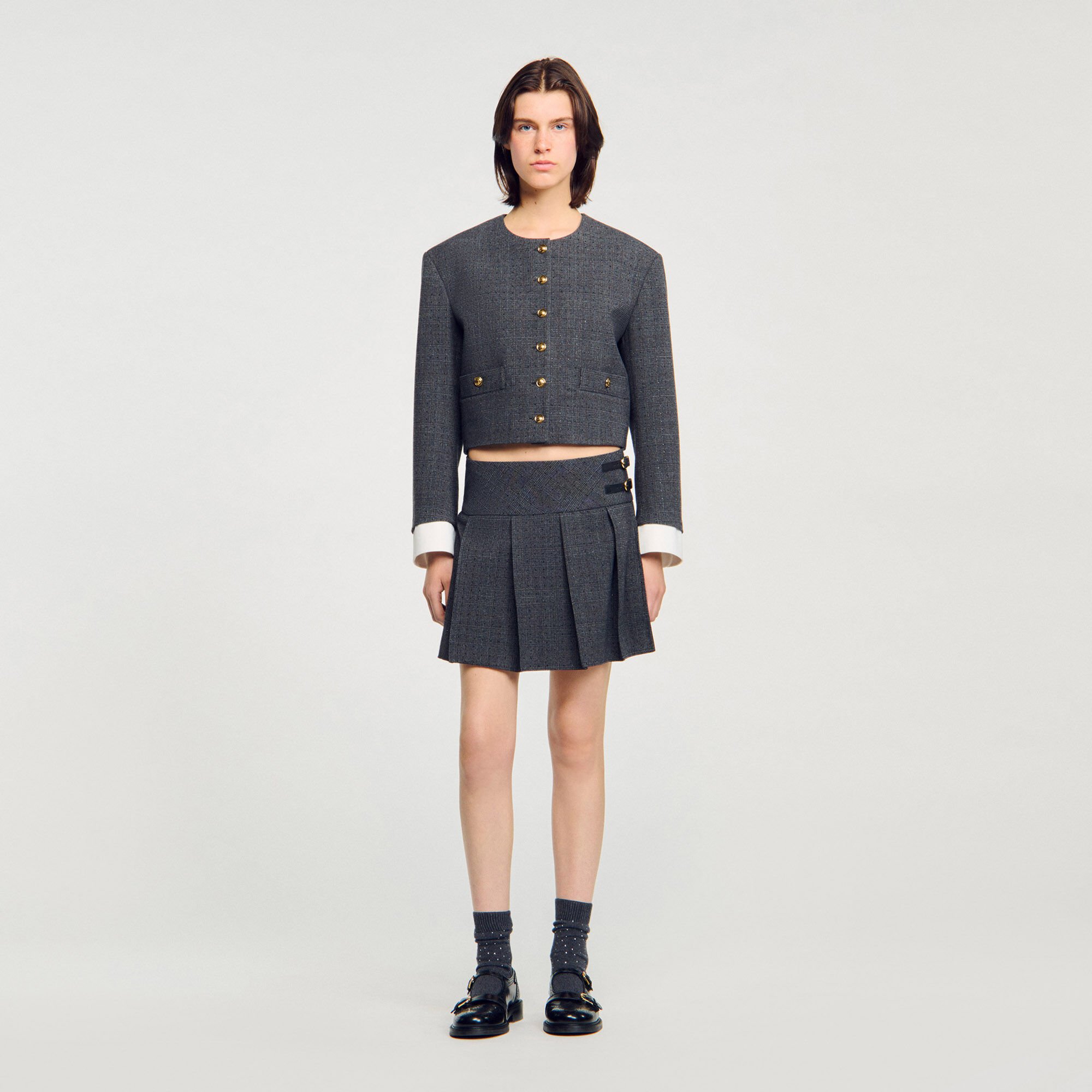 Jupe courte de tailleur strassée