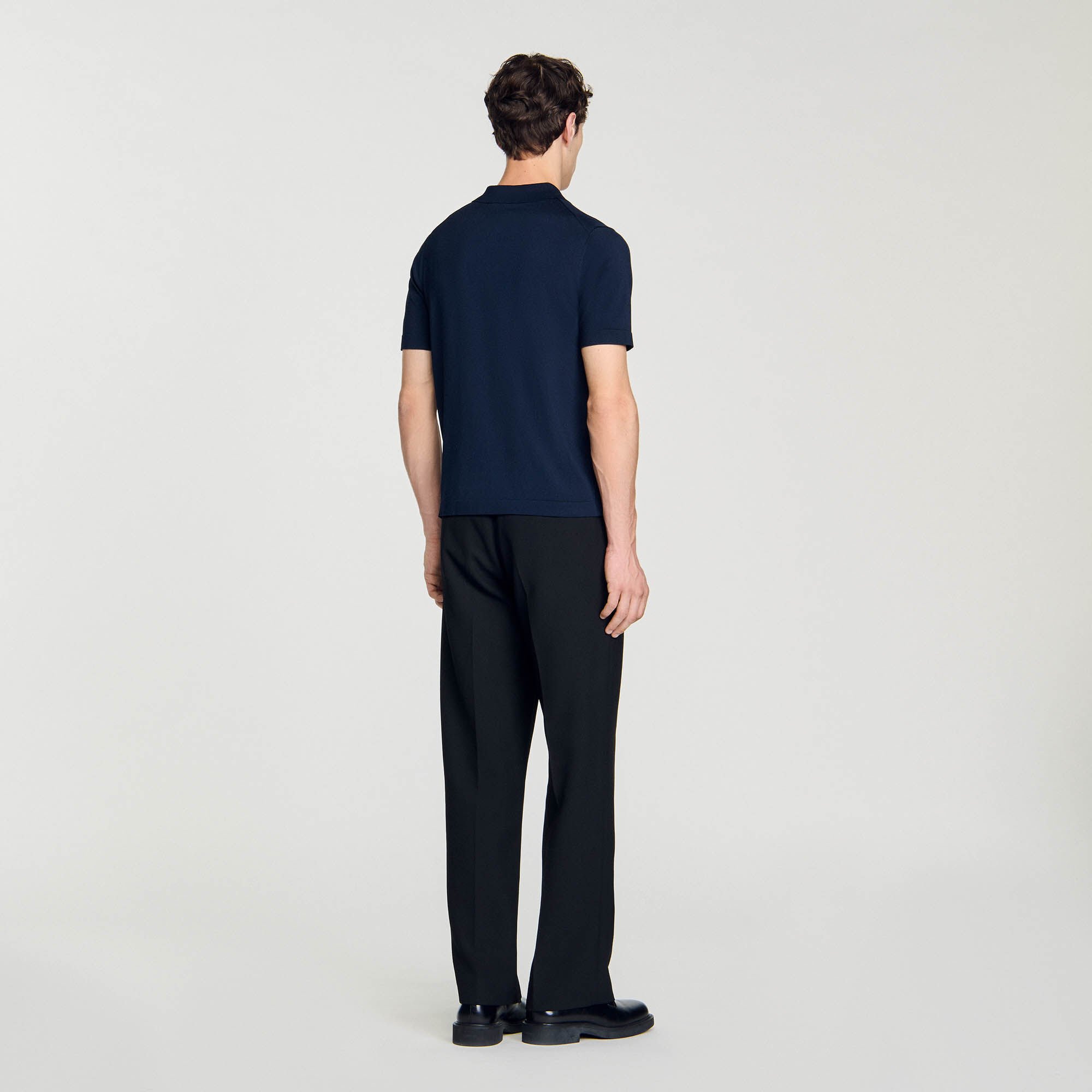 Polo en maille à col zippé
