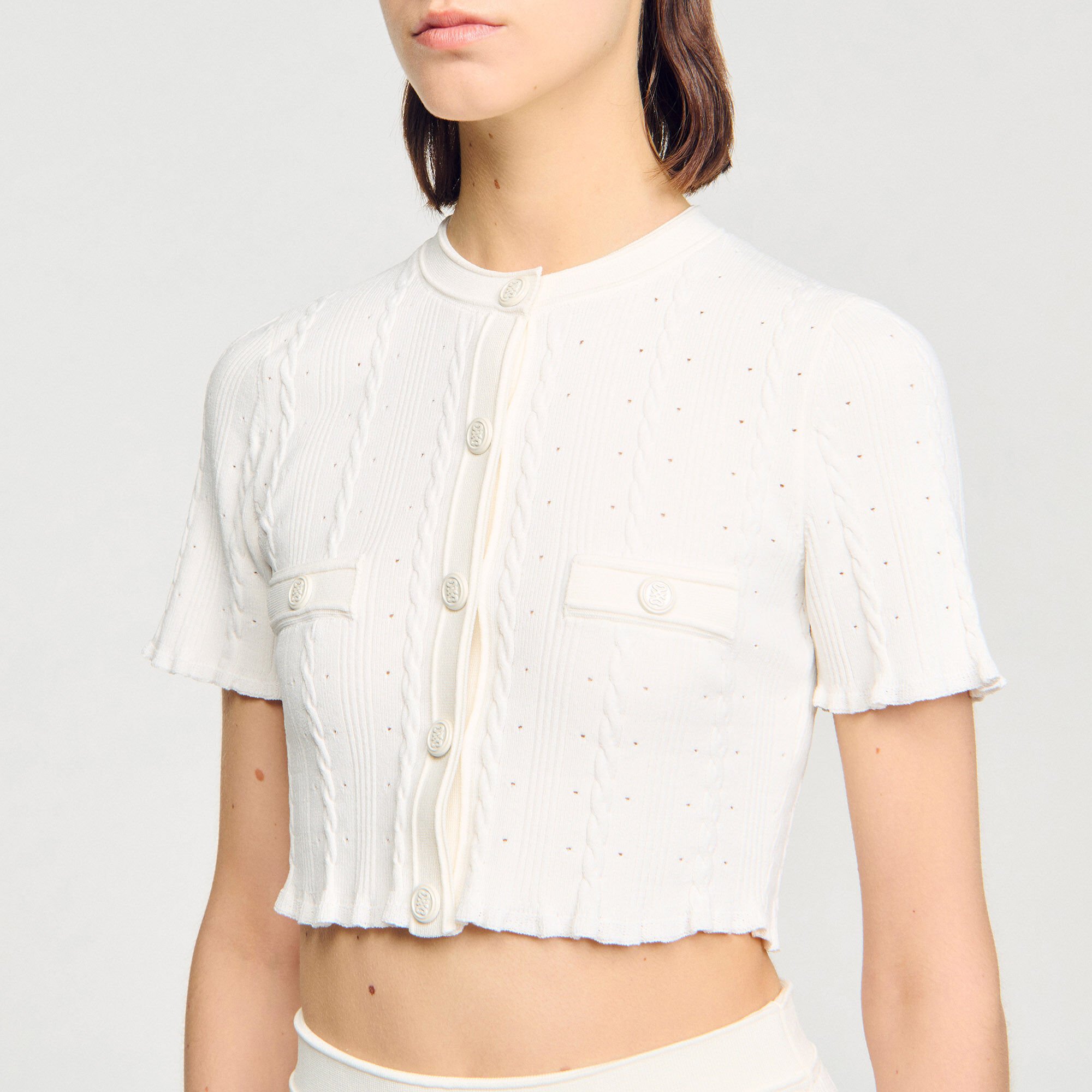 Cardigan court en maille pointelle
