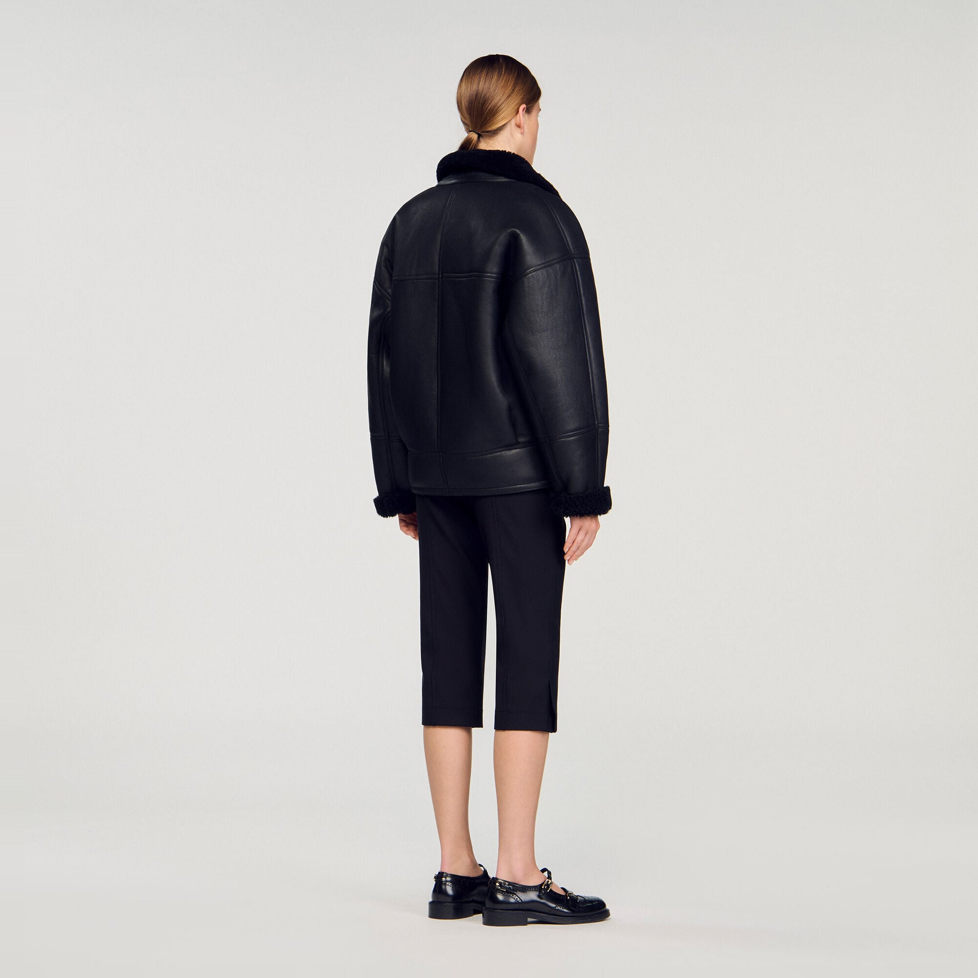 Manteau court en peau lain&eacute;e - Femme | Sandro Paris
