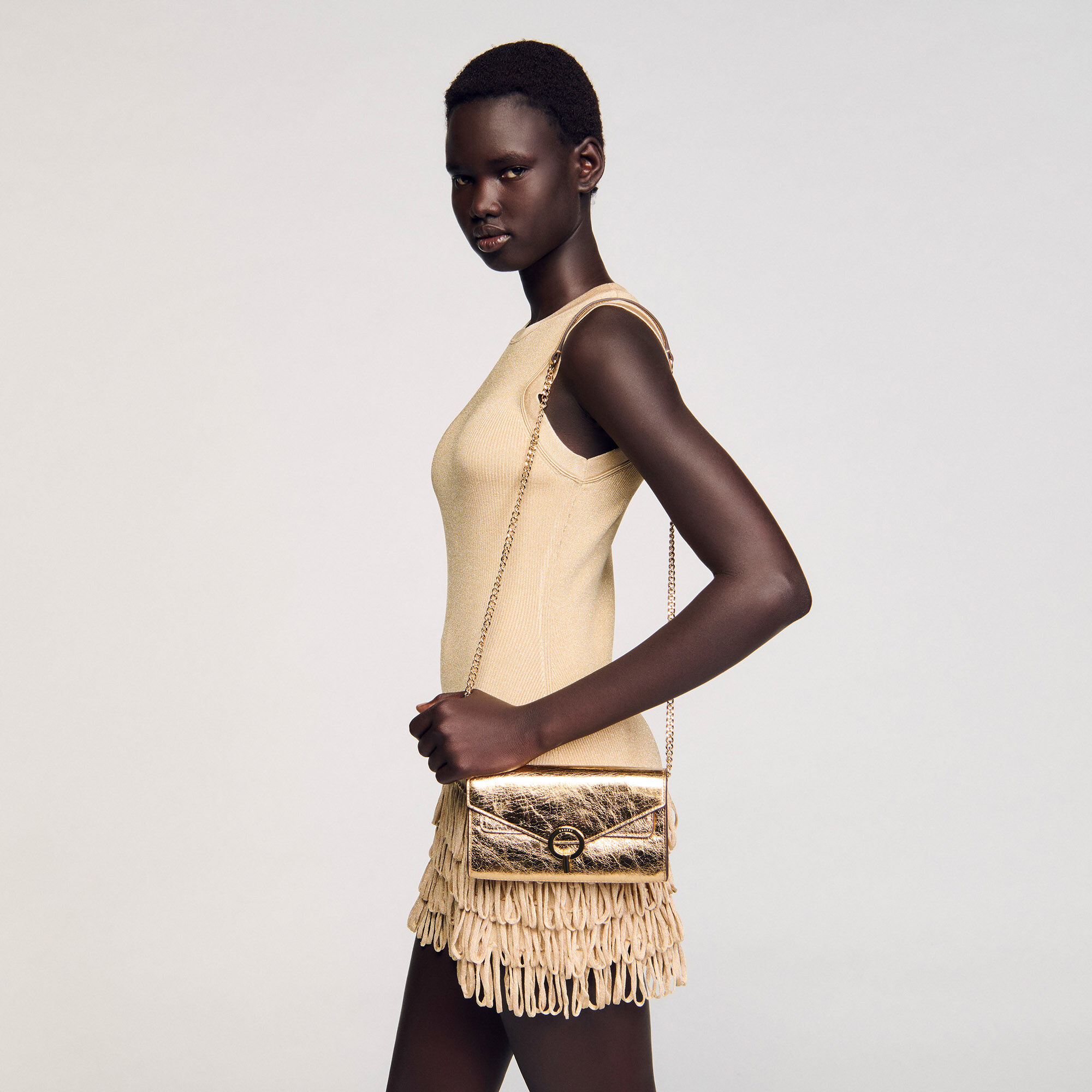 Sac pochette en cuir doré