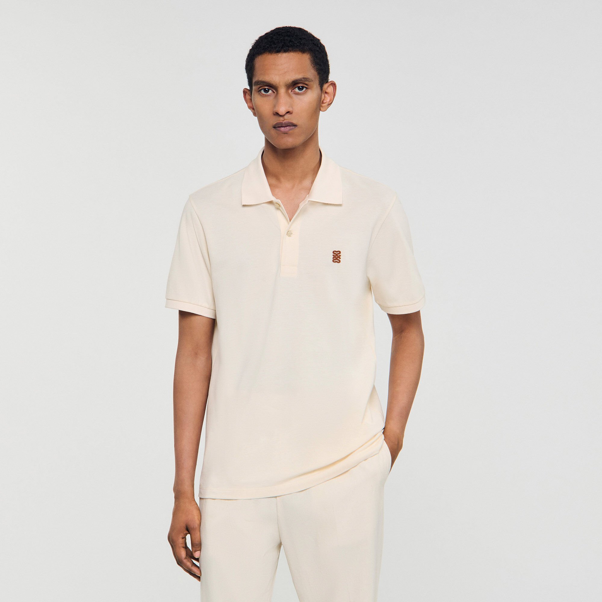Polo à logo cuir