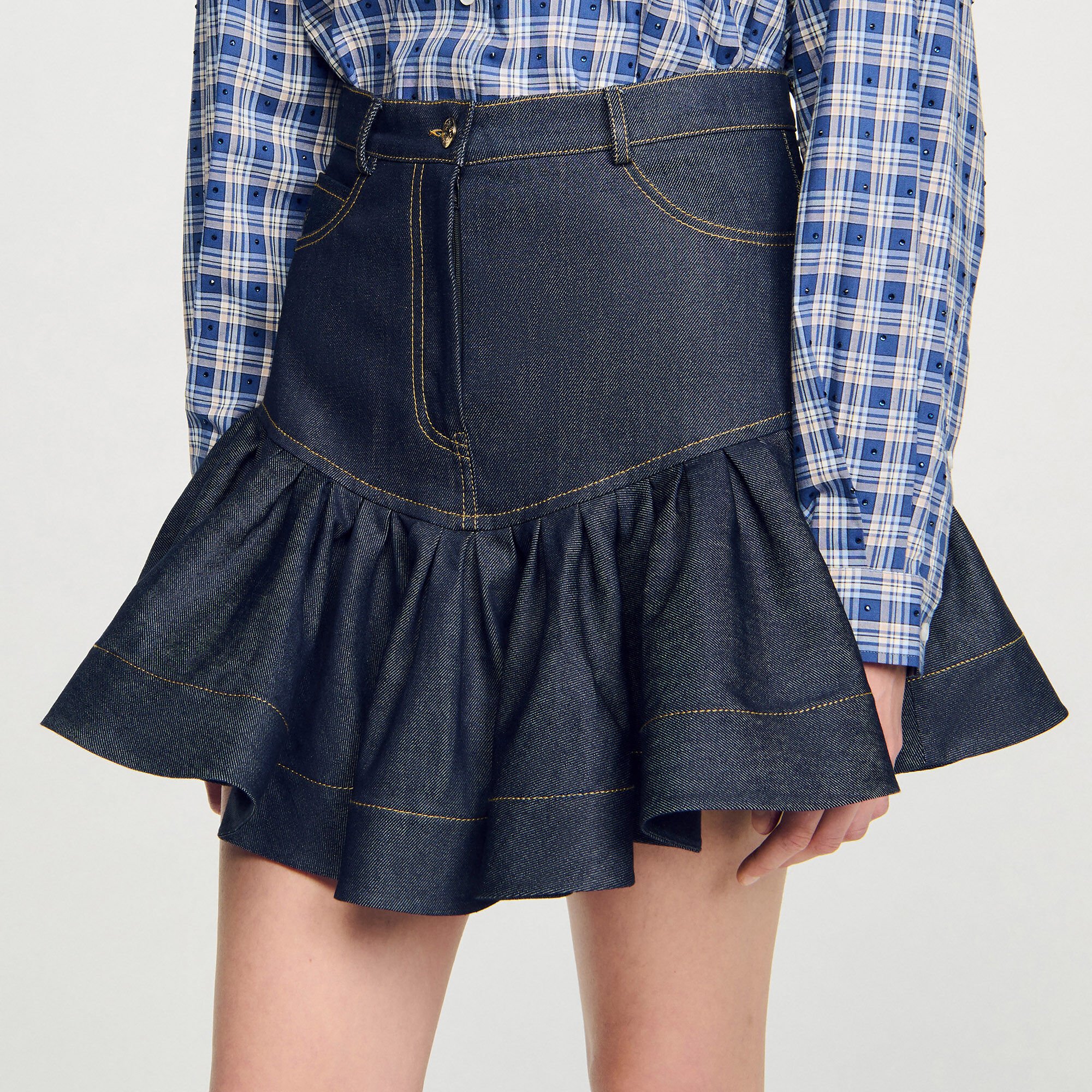 Jupe courte en denim à volants