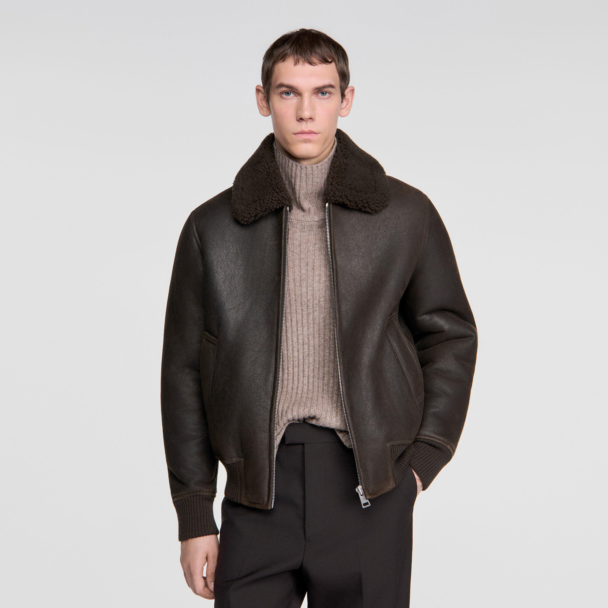 Blouson en peau lain&eacute;e - Homme | Sandro Paris