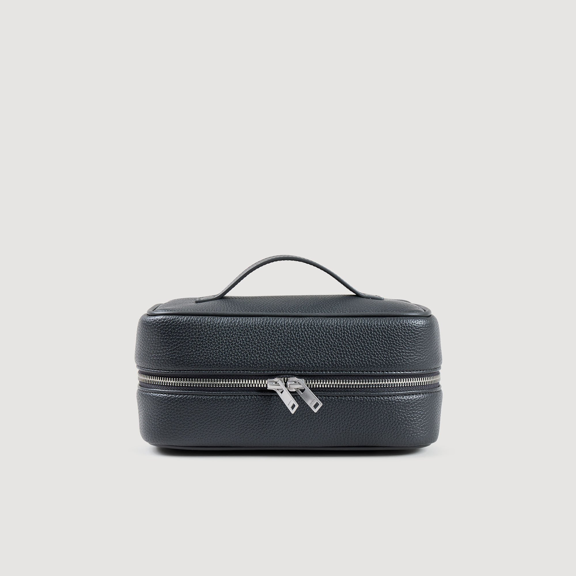 Trousse de toilette en toile enduite
