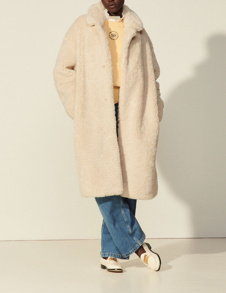 Sandro Manteau long en fausse fourrure. 1 Sandro Manteau long en fausse fourrure. 1
