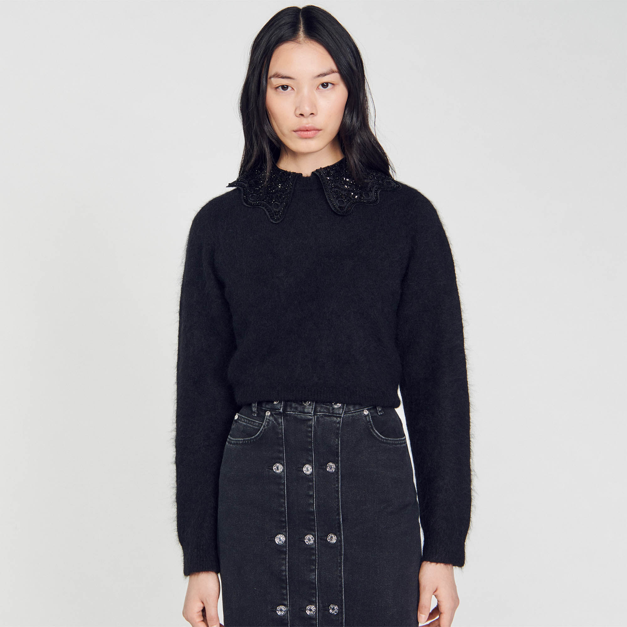 Pull sandro noir sales
