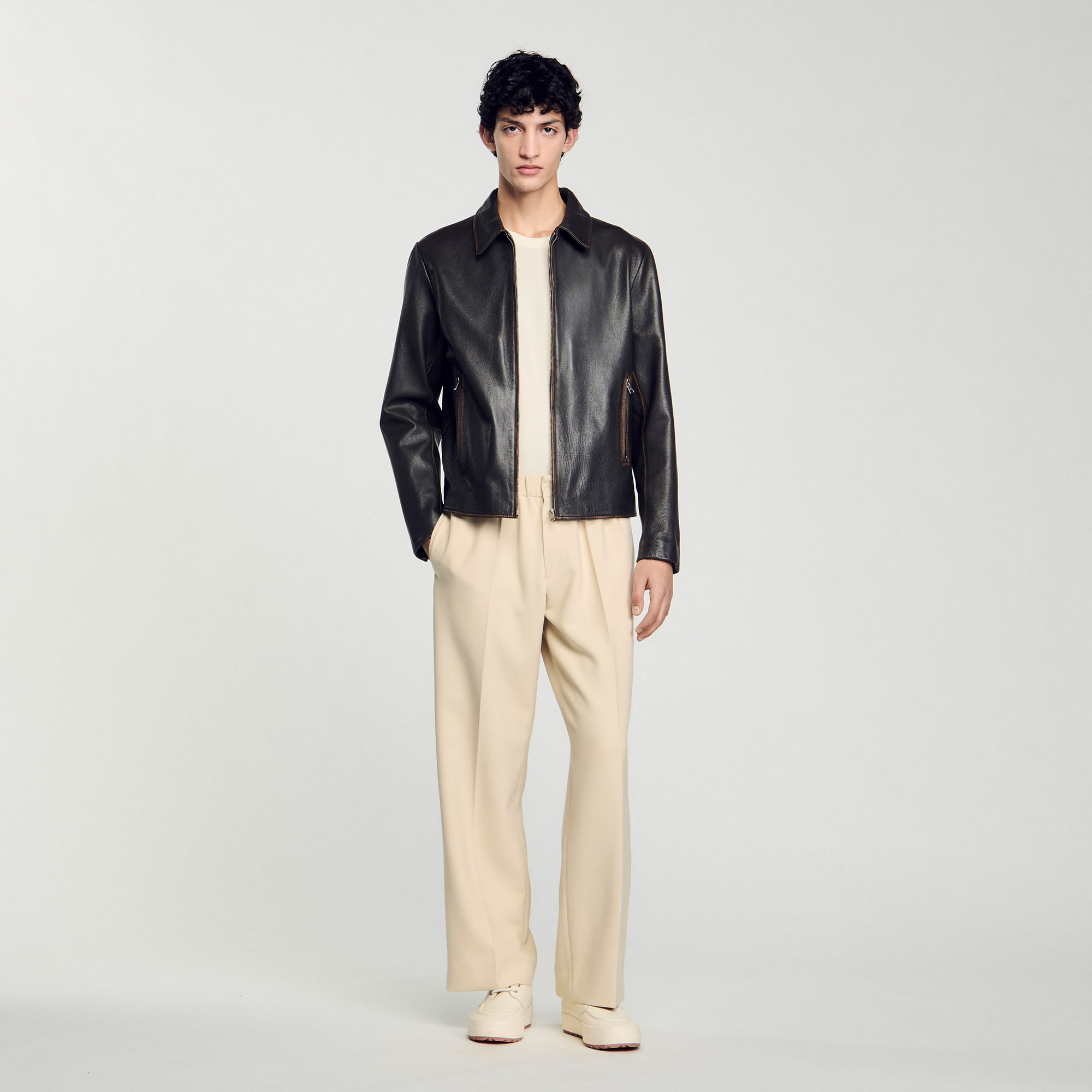 Blouson en cuir effet usé - Sandro Paris - Modalova